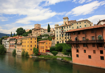 Fototapeta na wymiar Houses on the river of Italian town Bassano del grappa