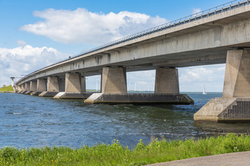 Fototapeta premium Concrete bridge over Dutch lake near Lelystad