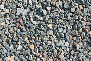 Abstract texture of the stone masonry colored stone.