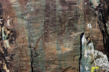rock painting human and animal
