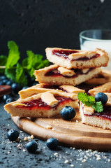 Homemade blueberry tart with mint