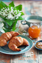 Croissants and jam for breakfast, selective focus
