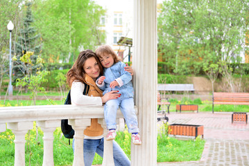 Mom and daughter 2.5 years for a walk in  gazebo