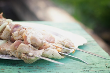 kebab skewers put on the meat on a skewer