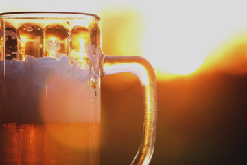 beer mug at sunset