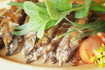 smoked capelin fish with garnish