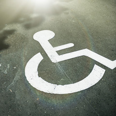 Disabled parking space with sun flare