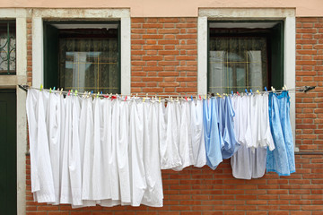 Fresh and clean clothes at window line