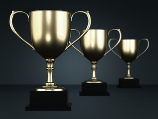 Golden cup trophies