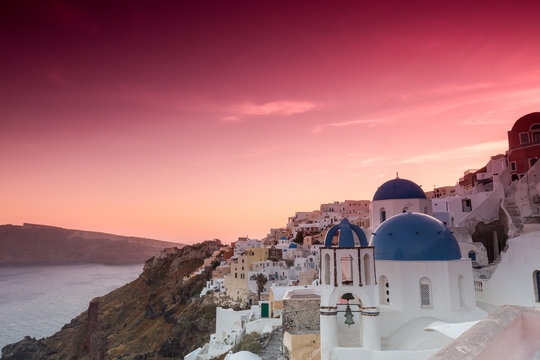 The sunset at Oia village in Santorini island in Greece