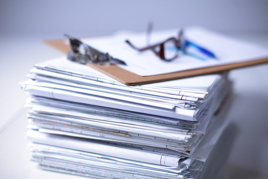 Big stack of papers ,documents on the desk