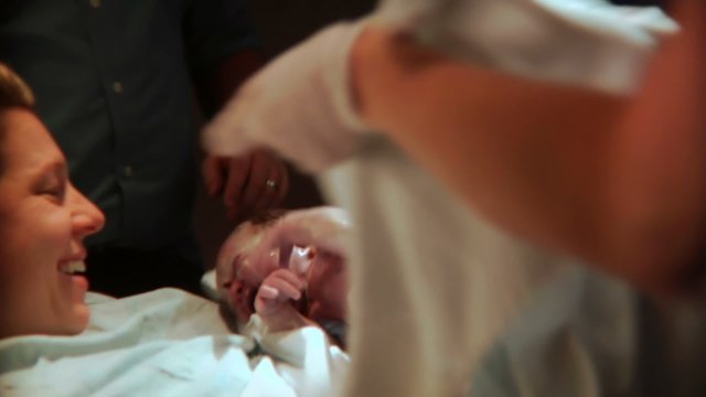 Woman gives birth to a baby