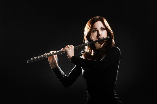 Flute player flutist with music instrument