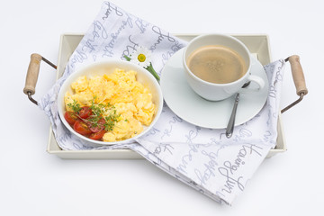 Aerial view tasty fresh scrambled eggs on plate white background