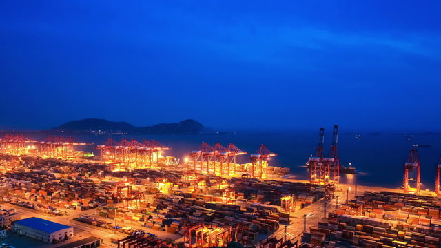 shanghai container terminal in nightfall ,time lapse