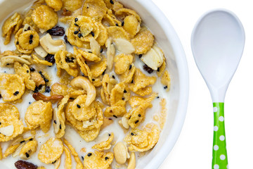 cereal made from cornflakes and caramel topped milk 