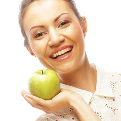 smiling woman with green apple