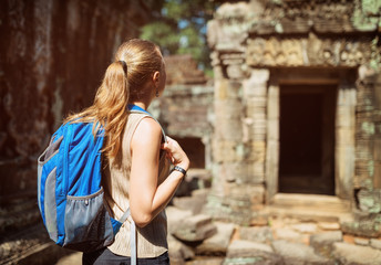 Female tourist in the Preah Khan temple in Angkor, Cambodia