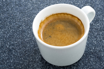 cup of coffee on a dark background