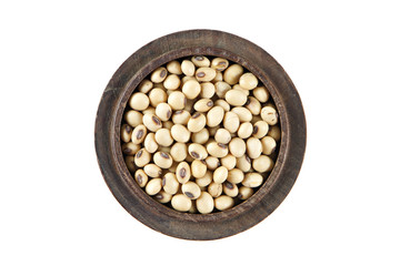 Black eyed peas in wood bowl set on isolated white., Top view