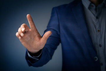  businessman pressing button with contact on virtual screens