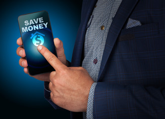 Businessman presses a button touch screen save money on smatrfon