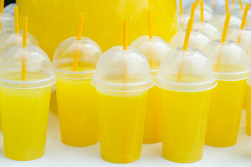 Yellow lemonade plastic cups