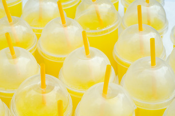 Yellow lemonade plastic cups