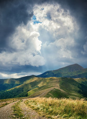 The sun breaks through the rain clouds.
