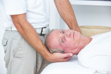 Fototapeta na wymiar Man receiving neck massage 