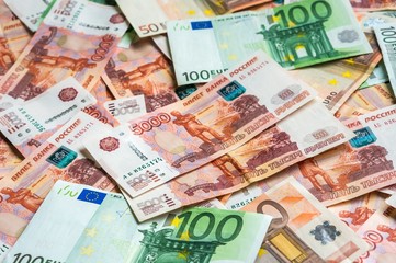 Fototapeta na wymiar Russian and Euro banknotes background