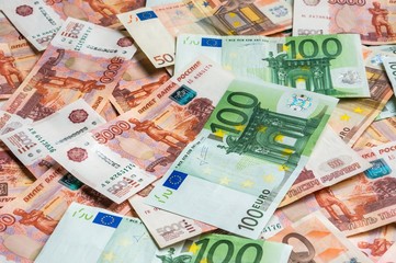 Russian and Euro banknotes background