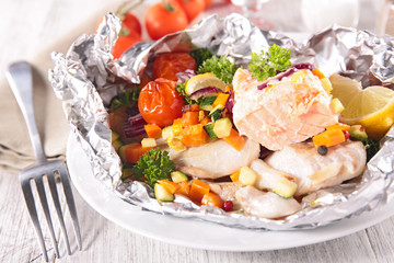 fish and vegetable cooked in paper