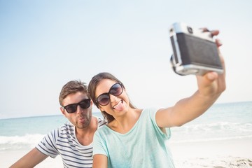 happy couple taking selfie