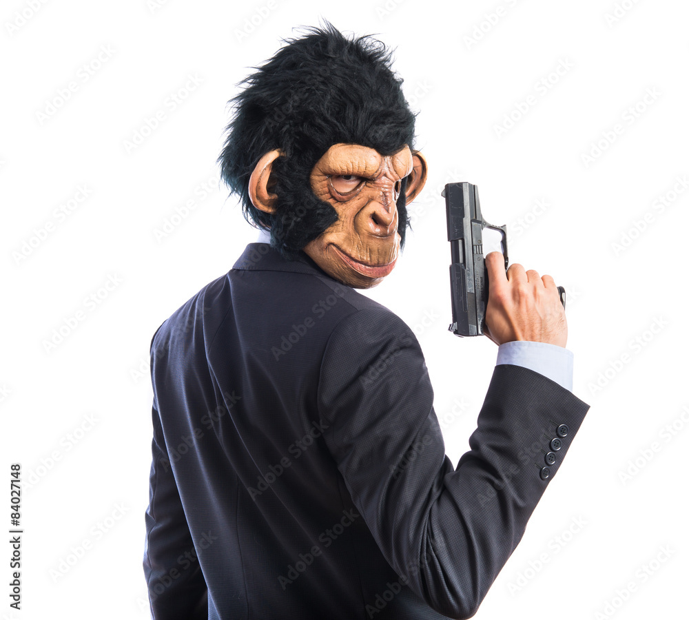 Wall mural monkey man with a gun