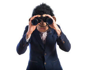 Monkey man with binoculars