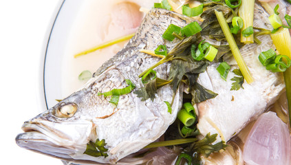 Malaysian dish of sweet and sour steamed Asian bass fish