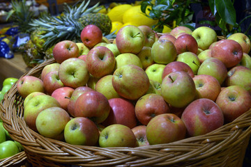 apples on display in a supermarket
