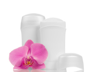 Fototapeta na wymiar Deodorants and orchid flower
