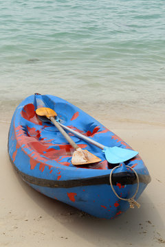 Canue or kayak on the beach.