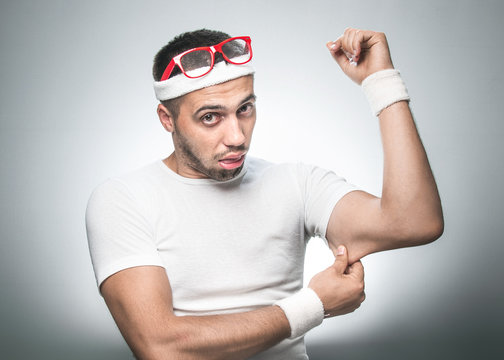 Funny man testing the flabby muscle under her arm - triceps
