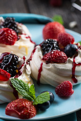 Homemade pavlova meringue with fresh berries