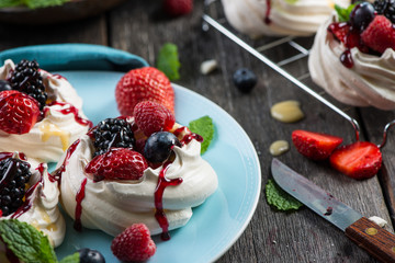 Homemade pavlova meringue with summer fresh berries