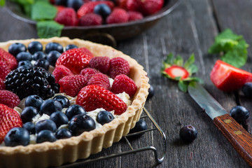 Homemade tart with fresh berries summer fruit