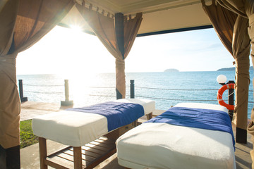 Fototapeta na wymiar massage bed by the beach