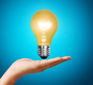  light bulb idea in the hand