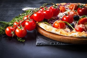 Pizza with cherry tomatoes and arugula