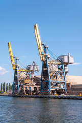 Fototapeta na wymiar Two container cranes in Gdansk harbor