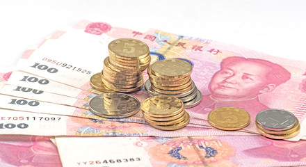Chinese renminbi 100 bank note and coins