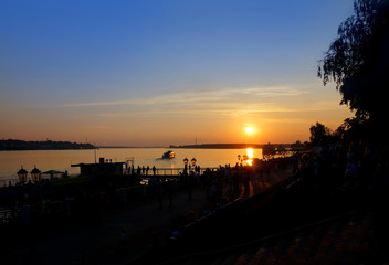 Sunset on coast of river Volga